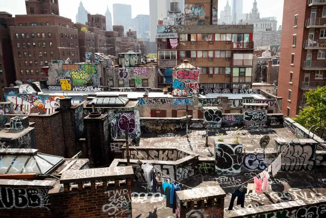 Dresses hanging outside a garment shop in Cortlandt Alley, Lower East Side, New York