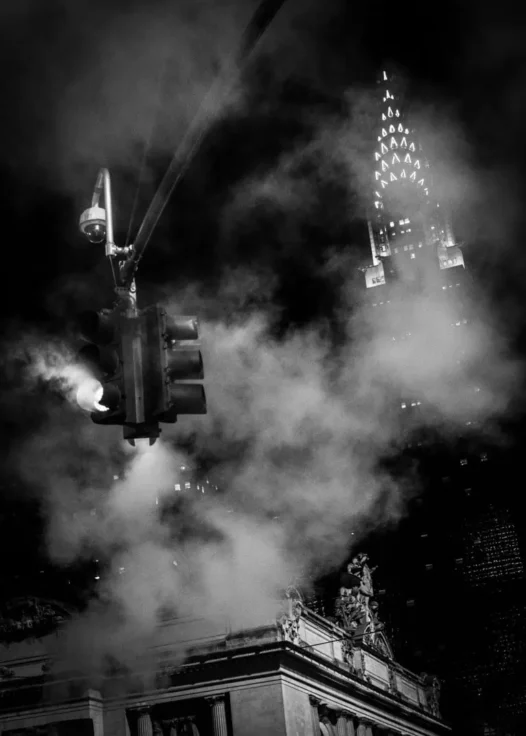 The Chrysler Building, Grand Central, and Lamppost engulfed in street smoke.
