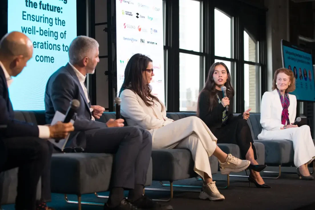 Panel speaker on stage • Devex • New York City conference photographer
