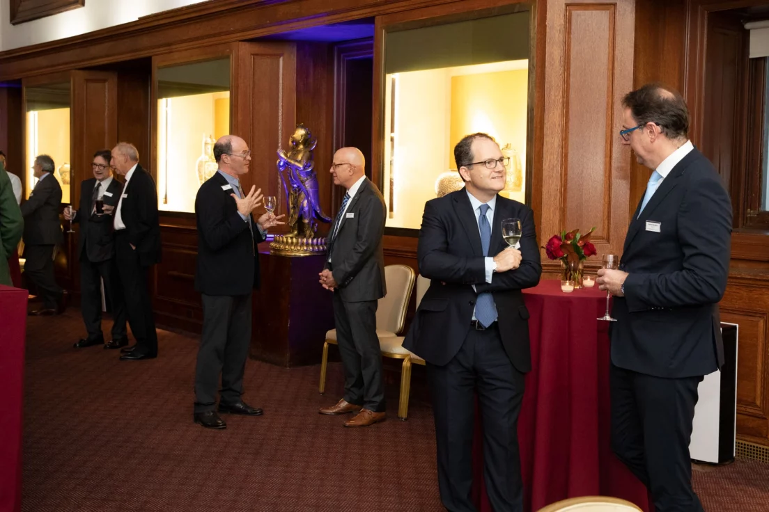 Candid networking conversation • Columbia University • NYC corporate event photographer